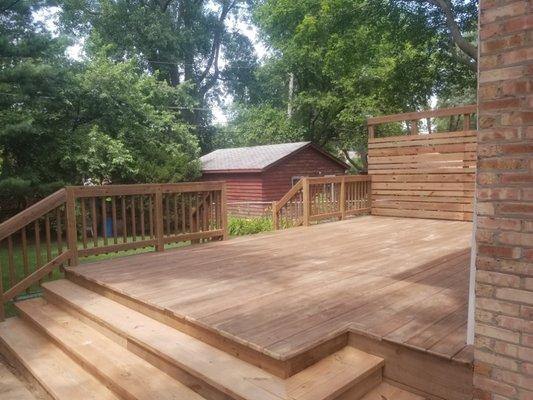 Cedar tone deck with privacy wall