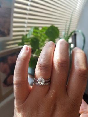 Engagement ring with grandmother's diamond.