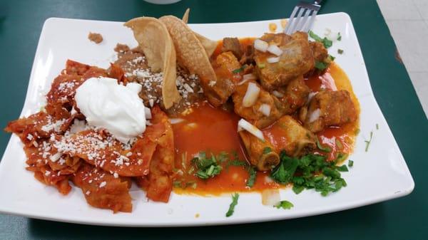 Costillitas en  salsa  roja  con  chilaquiles and beans... yum