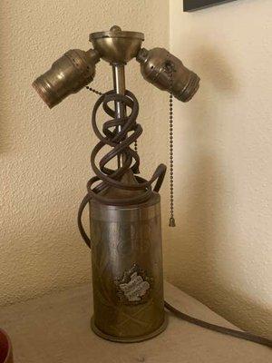 We helped a customer with this vintage WWII "trench art" lamp her uncle brought back from Europe. She's keeping it in the family.