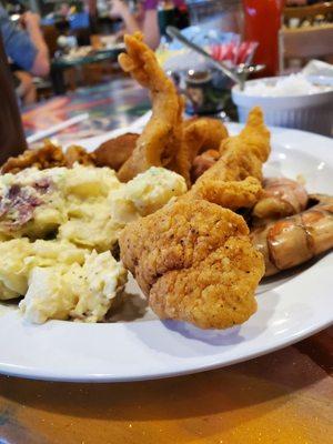 Fish, shrimp, crab cake, potato salad,  boiled shrimp, hush puppy