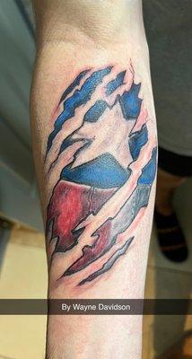 This tattoo was the one done by WAYNE DAVIDSON