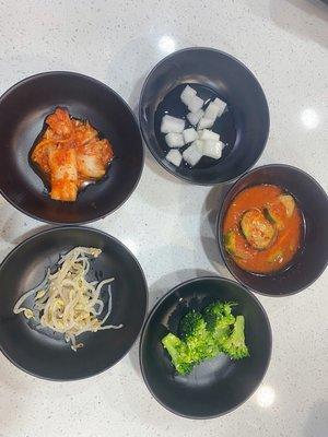 Ban Chan        kimchi. Soybean sprouts. Broccoli .pickle cucumber . Sweet sour Korean raddish  free appetizer and free refills