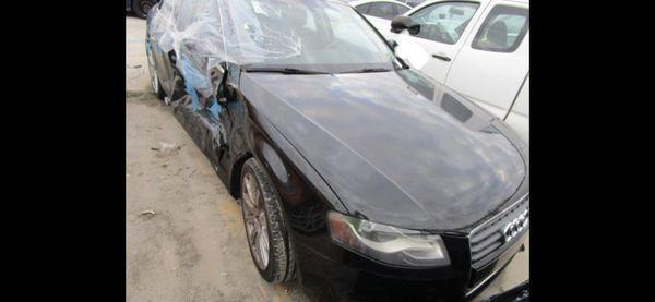 A HORRIBLY wrecked Audi A4 that Mohammed tried to  sell (probably did sell) after it was fixed.