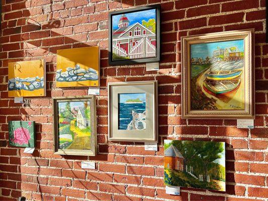 Colorful paintings on the walls are for sale and very reasonably priced!