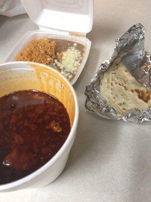 Birria De Res (beef stew)-somewhat spicy. Comes with tortillas, rice, and beans for $14.50. Five stars for the soup *****