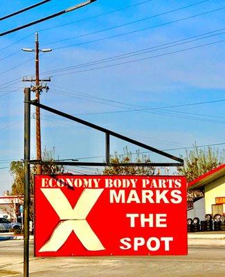 TWO businesses with "Economy" in the name close together on same street- the Auto Glass place w/ the great reviews has this sign in front...