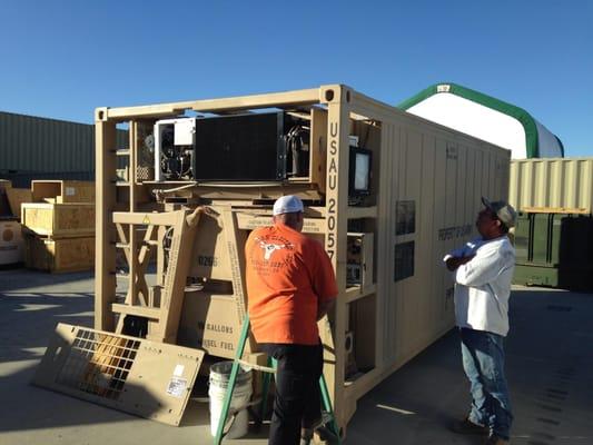 Repairing a portable refrigeration unit for the US Army at Ft Irwin, Ca