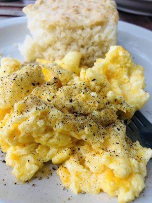 Homemade biscuit, scrambled eggs with cheddar