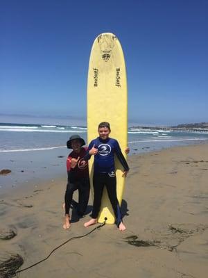 Mike and Cooper posing after a great surf lesson!