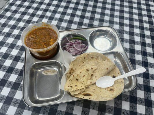 Chicken Masala and fresh baked Roti