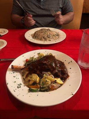 Lamb shank and schnitzel with mushroom gravy.