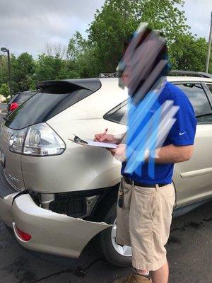 As you can see the attendant taking notes on the bumper that is falling off