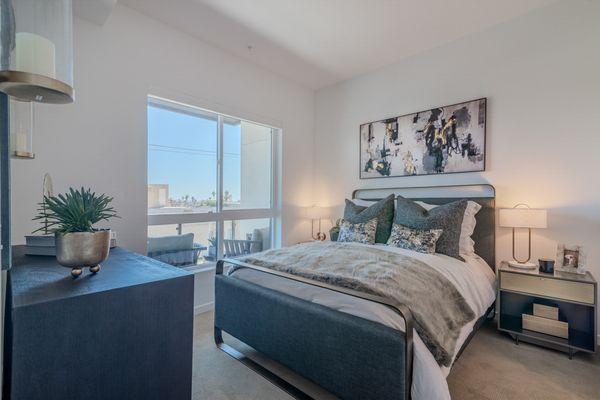 Bedroom with high ceilings and great views.