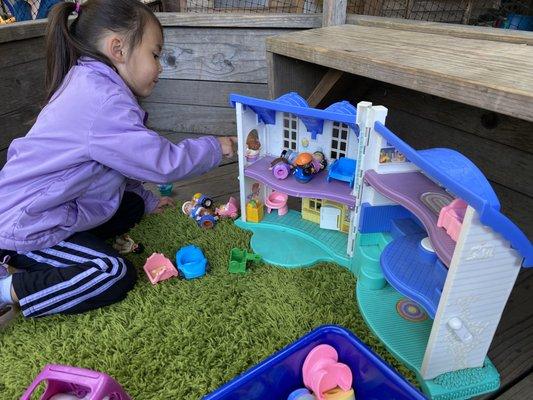 My daughter playing with one of the play houses