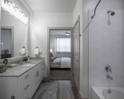 Serene bathroom with tub and shower