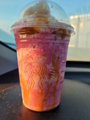 Grande vanilla creme Frappuccino with dragon fruit and strawberry inclusion with extra caramel drizzle