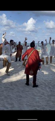 Groom & Groomsmen at beach baraat