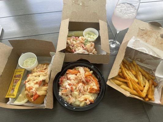 Lobster Connecticut roll with spicy mayo , colossal Shrimp roll French fries and the lobster Mac and cheese