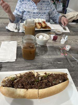 Steak and cheese sub and a Belgium waffle