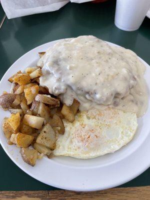 Chicken fried steak with country potatoes