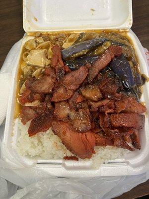 Three item combo on white rice. Bbq pork, mabo tofu and eggplant. Came with a green tea.