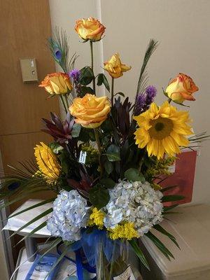 Colorful and masculine arrangement, the day after delivery. Unfortunately, the roses didn't last long - some less than 24 hours.  :/