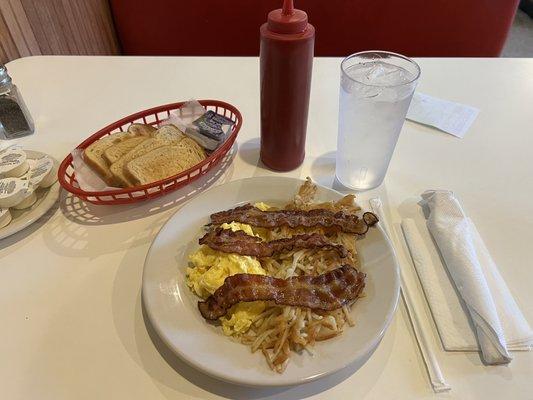 Breakfast Special   2 scrambled eggs bacon hash browns and toast