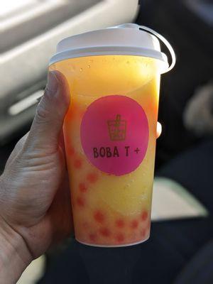 Mango Peach slushy with strawberry popping boba