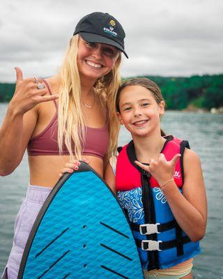 Kids camp wakesurfing fun with coach and pro wakesurfer, Emma Galusha.