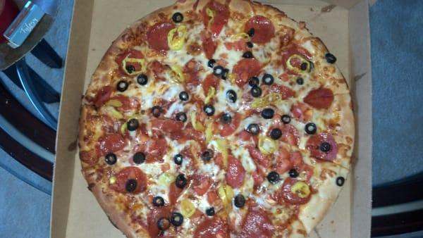 Large pizza with pepperoni, olives, tomatoes and banana peppers...