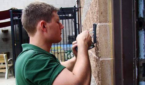 one of our technicians servicing a client's alarm system