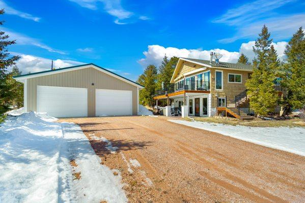 Would you like to live year-round in Red Feather Lakes, CO? 
33 Walela Ln has 3 bedrooms/2 bathrooms and a huge toy garage!
Call for info!