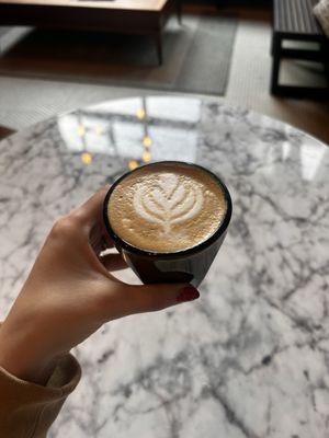 Brevé cortado with honey