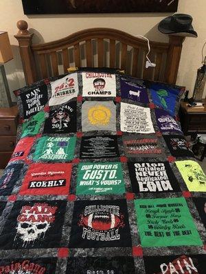 Queen size t-shirt quilt made by cuts and Bolts.