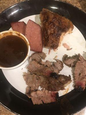 The thigh, some brisket and the sausage on my plate with the bbq sauce. I tried one bite of each. Disgusting.