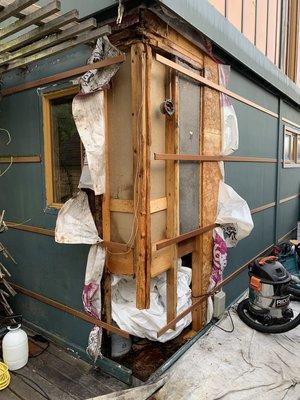 Dry rot repair on a house boat.