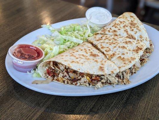 It really wasn't that good. The chicken quesadilla look good on the outside, it was more like a chicken cheesesteak on a tortilla shell.