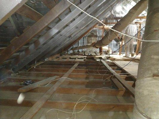 Attic insulation removal