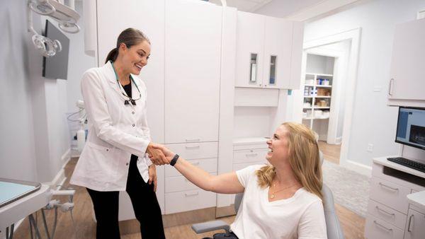 Dr. Gower meeting a patient