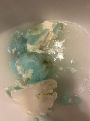 Cotton Candy Water Ice with a dark dot of metallic substance