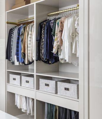 Her primary closet--organized in a beautiful system she can sustain