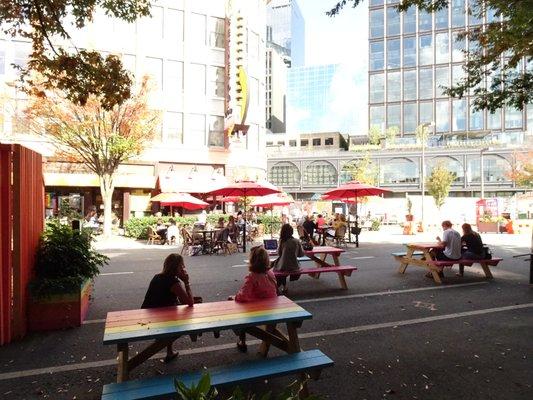 Outdoor dining on closed-off Woodmont Ave