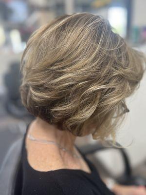 Color, highlights, cut and style by Martika.