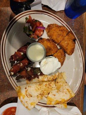 Cancun sampler- Bacon- wrapped jalapeño poppers, cheese quesadilla, and chicken!