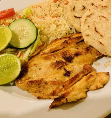 Meat Entree: Pechuga (chicken) with rice, a small salad, and two handmade fresh corn tortillas. Delicious! Hot and Fresh!