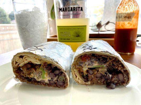 Burrito asada (left) Carnita (left) Carnita is the winner!