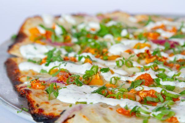 Patatas Brava
Oil Base, Roasted Potato, Red Pepper, Onion, Fresh Mozzarella, Romesco, Cilantro, Lime Crema, Green Onion