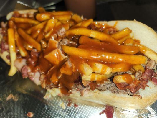 Belly Buster Fat Sub  cheese steak, roast beef, chicken finger, mozzarella sticks, french fries, Barbeque sauce