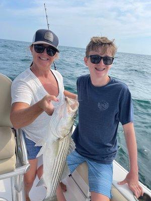 Our first striped bass- released it. But so fun to reel in.